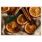 Dried oranges, cinnamon and star anise on linen, print in a natural wood frame