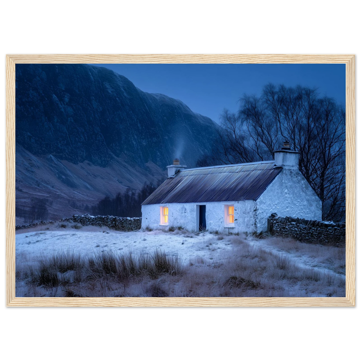 Highland cottage with lit windows in winter, print in a pale natural wood frame