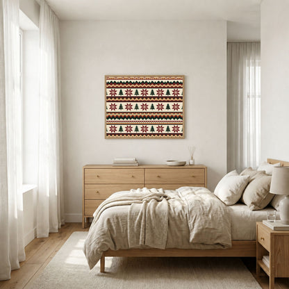 Fair Isle knitting pattern, in a black frame on a white wall above a bed with cream linen in a bright bedroom
