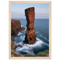 Red sandstone sea stack at last light above an Atlantic cliff coast, print in a natural light wood frame