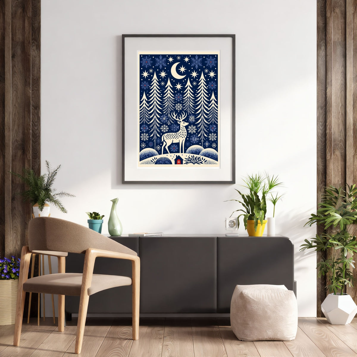 Folk-art winter glen, in a black frame above a dark wood sideboard against a rustic timber wall