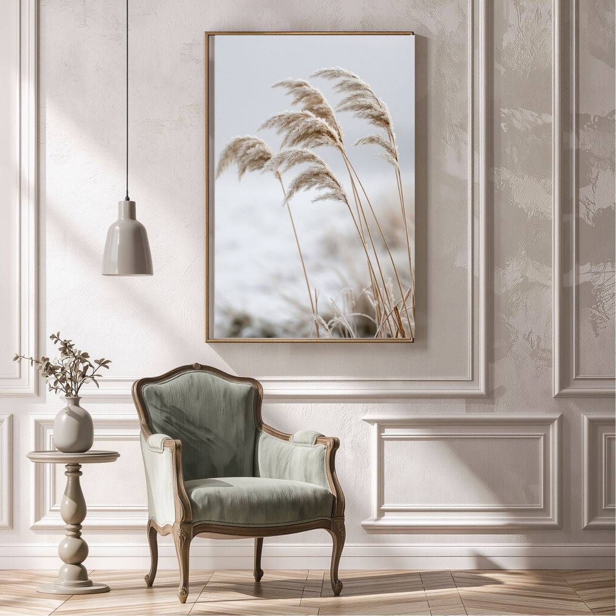Frosted reeds print in a wood frame above a green velvet armchair in a panelled sitting room