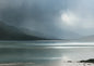 A Highland glen dissolving into rain, dark shore in the foreground and a band of silver light across the loch