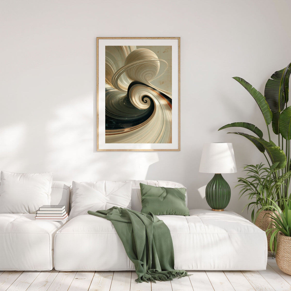 Ivory spiral abstract, in a natural wood frame above a white sofa with a sage green throw in a bright living room
