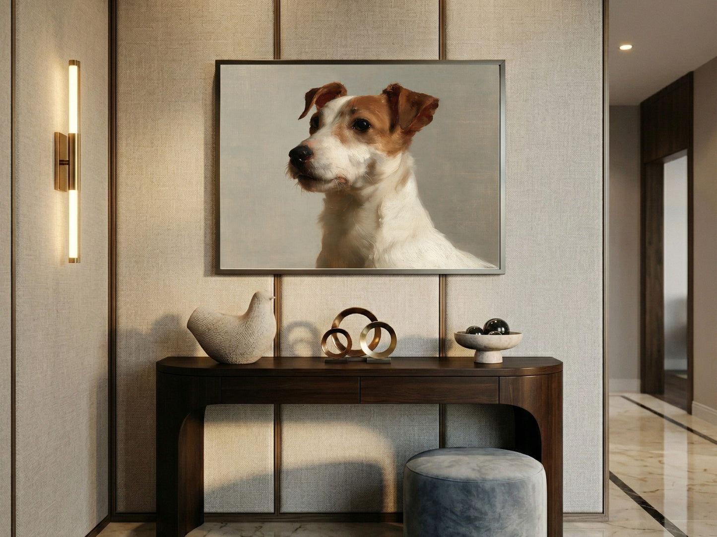 A Jack Russell terrier oil portrait hanging above a curved console table in a panelled hallway