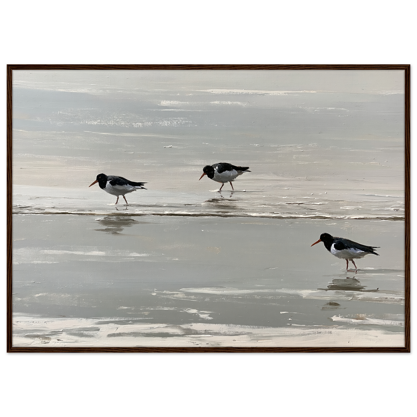 Oystercatchers on the tideline coastal print in a dark brown wood frame