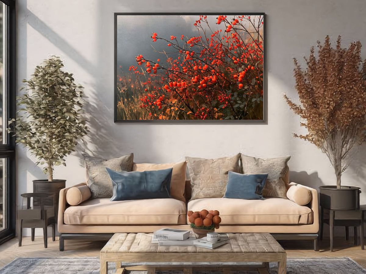 An autumn hedgerow of scarlet rosehips in oil, hanging above a cream sofa in a bright living room