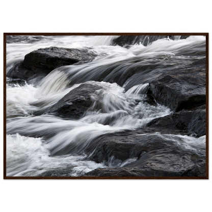 Silk water over dark rock, print in a dark wood frame