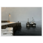 Two fishing boats at a snow-covered pier, print in a white frame