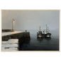 Two fishing boats at a snow-covered pier, print in a natural wood frame