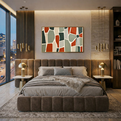 Stone mosaic in rust and sage, in a dark frame above a velvet bed in a city apartment bedroom at night
