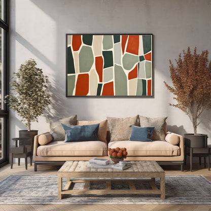 Stone mosaic in rust and sage, in a dark frame above a linen sofa in a bright high-ceilinged living room