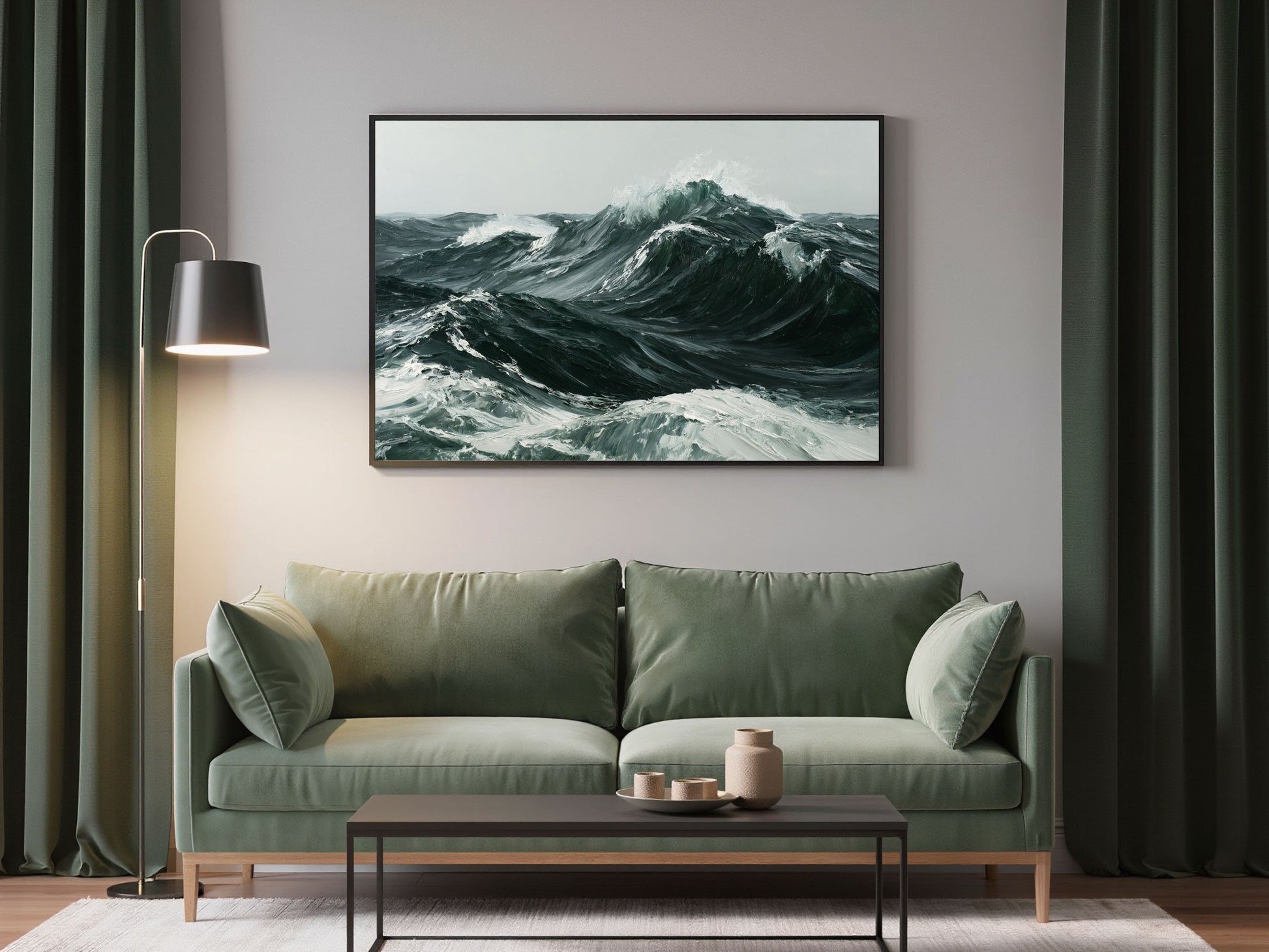 Heavy Atlantic swell in thick oil paint, in a dark frame above a sage green sofa
