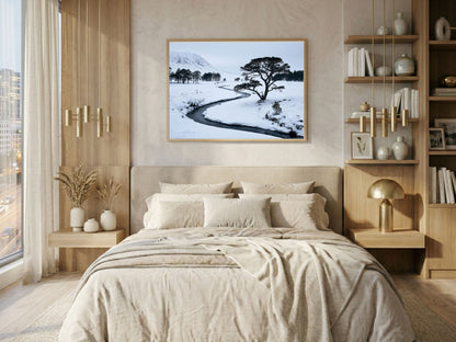 Frozen burn print in a wood frame above a bed in a warm wood-panelled bedroom