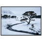 A snow-filled Highland glen with a frozen burn, print in a black frame