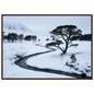 A snow-filled Highland glen with a frozen burn, print in a dark wood frame