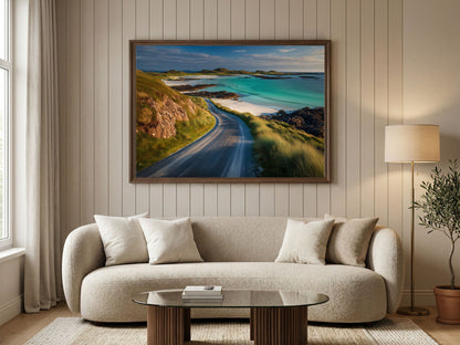 Winding coast road above a turquoise Hebridean bay, in a wooden frame above a boucle sofa