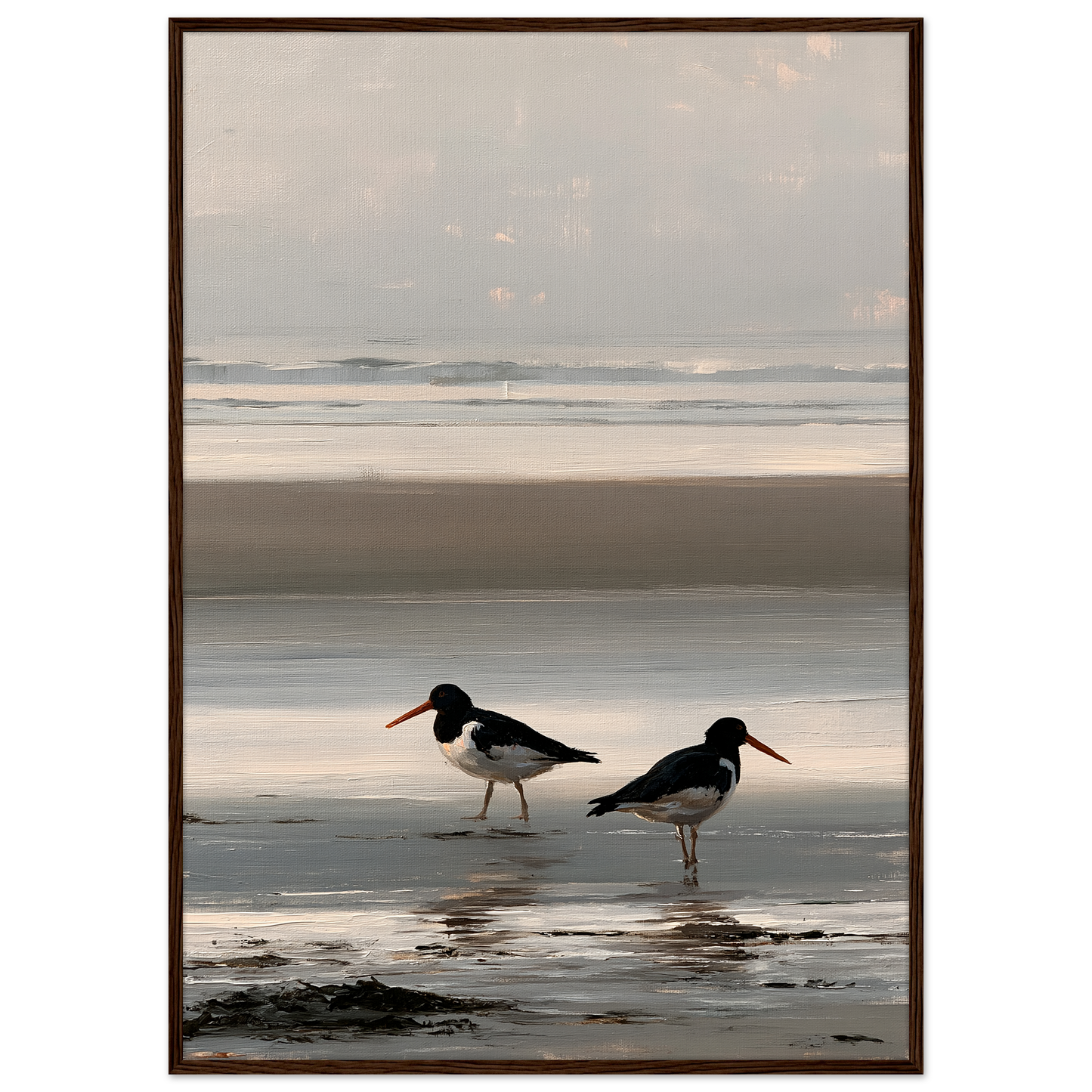 Two oystercatchers at low water coastal print in a dark brown wood frame